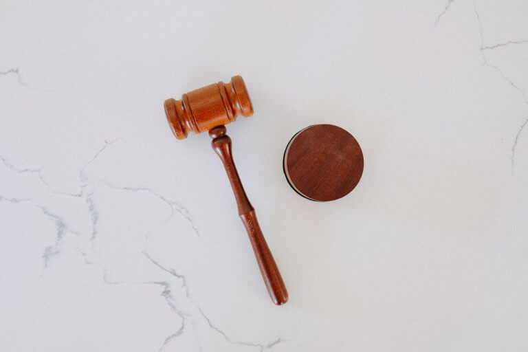 Gavel on Marble Background | Plan your estate today!