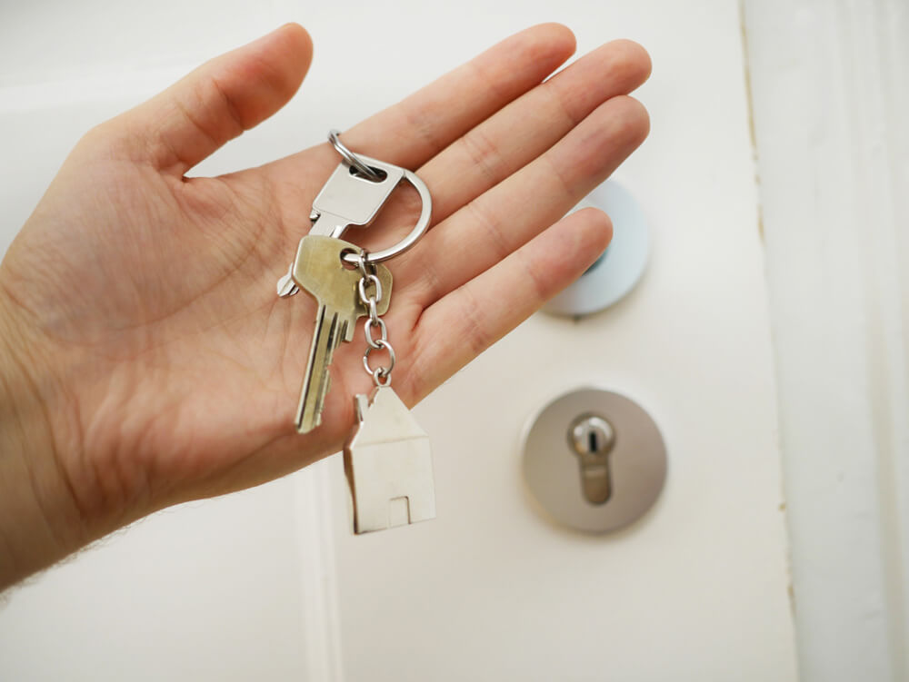 Hand Holding Keys | Planning Your Estate